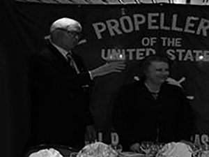 Old picture of a man and a woman in Propeller club of the United States