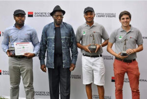 Golf tournament players with their awards.