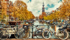 Popular Biking Destination Over a Canal in Amsterdam, Netherlands
